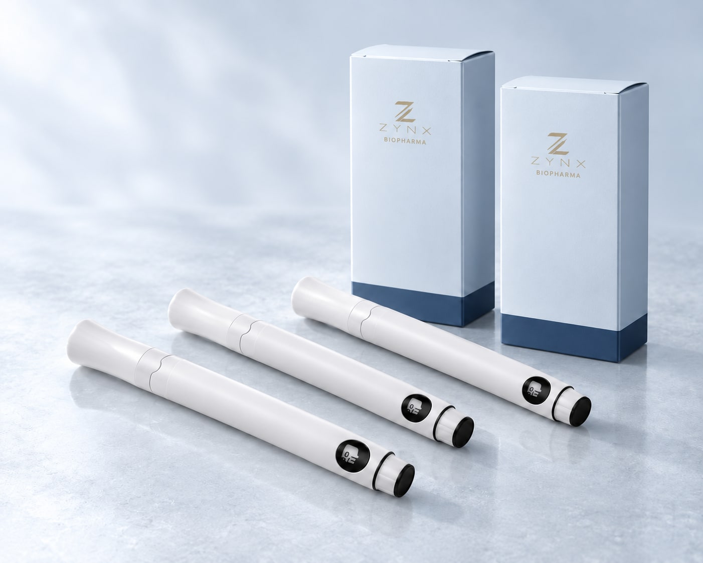 Three white research pens lying in front of two closed pale blue boxes printed with the Zynx Biopharma logo.